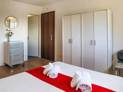 Ein Bett oder Betten in einem Zimmer der Unterkunft Apartment Rosablanche D44 by Interhome