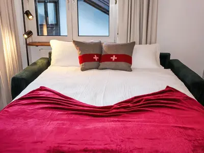 Ein Bett oder Betten in einem Zimmer der Unterkunft Apartment Sonnhalde A by Interhome