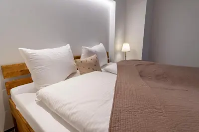 Ein Bett oder Betten in einem Zimmer der Unterkunft Interlaken Mountain View