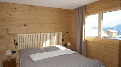 Ein Bett oder Betten in einem Zimmer der Unterkunft Chalet Sofia