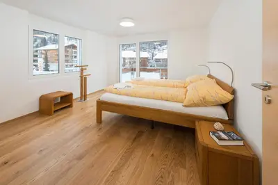 Ein Bett oder Betten in einem Zimmer der Unterkunft Millegga Grächen