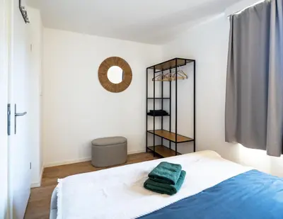 Ein Bett oder Betten in einem Zimmer der Unterkunft Central City Apartment 2 with Mountain View