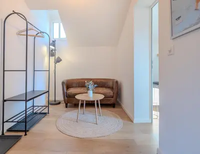 Ein Sitzbereich in der Unterkunft Central City Apartment 2 with Mountain View
