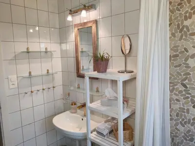 Ein Badezimmer in der Unterkunft Apartment Chalet Aebnit by Interhome