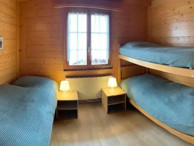 Ein Bett oder Betten in einem Zimmer der Unterkunft Holiday Home Chalet Bärgblüemli by Interhome