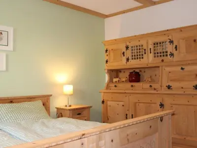 Ein Bett oder Betten in einem Zimmer der Unterkunft Apartment Chalet Silberdistel B11 by Interhome