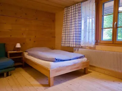 Ein Bett oder Betten in einem Zimmer der Unterkunft Apartment Chalet Ried by Interhome