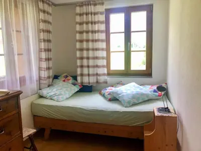 Ein Bett oder Betten in einem Zimmer der Unterkunft Apartment Chalet Ried by Interhome