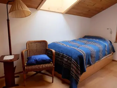 Ein Bett oder Betten in einem Zimmer der Unterkunft Apartment Chalet Ried by Interhome