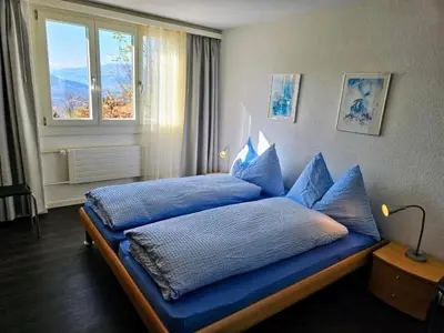Ein Bett oder Betten in einem Zimmer der Unterkunft Apartment Chalet Friedheim by Interhome