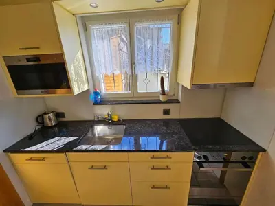Küche/Küchenzeile in der Unterkunft Apartment Chalet Friedheim by Interhome