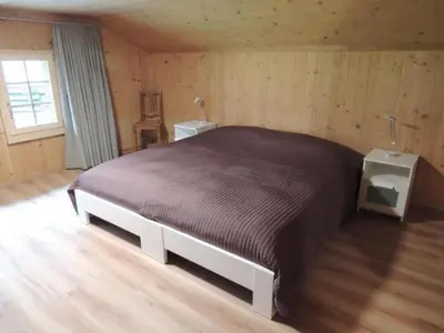 Ein Bett oder Betten in einem Zimmer der Unterkunft Holiday Home Lengwald Hiisli by Interhome