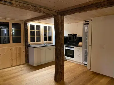 Küche/Küchenzeile in der Unterkunft Holiday Home Chalet Brünig mit zwei Wohnungen by Interhome
