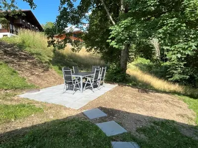 Ein Garten an der Unterkunft Holiday Home Chalet Alpen Lotus by Interhome