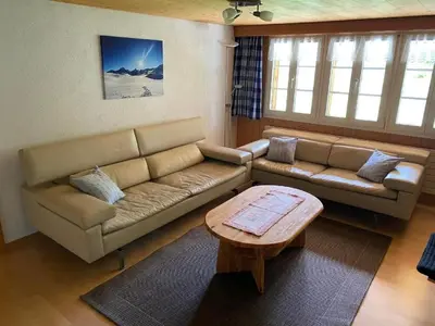 Ein Sitzbereich in der Unterkunft Apartment Chalet Herrschaft 4 Bett Wohnung by Interhome