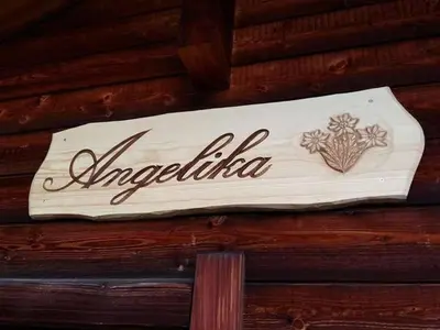 Ein Zertifikat, Auszeichnung, Logo oder anderes Dokument, das in der Unterkunft Holiday Home Chalet Angelika by Interhome ausgestellt ist