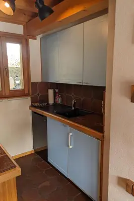 Küche/Küchenzeile in der Unterkunft Holiday Home Chalet Le Griffon by Interhome