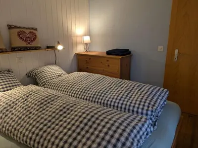Ein Bett oder Betten in einem Zimmer der Unterkunft Holiday Home Chalet Le Griffon by Interhome