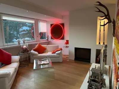 Ein Sitzbereich in der Unterkunft Apartment LaConcorde Golf App2 by Interhome