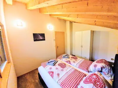 Ein Bett oder Betten in einem Zimmer der Unterkunft Apartment Chalet Eigernordwand by Interhome