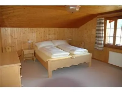 Ein Bett oder Betten in einem Zimmer der Unterkunft Apartment Uf dr Liwwi by Interhome