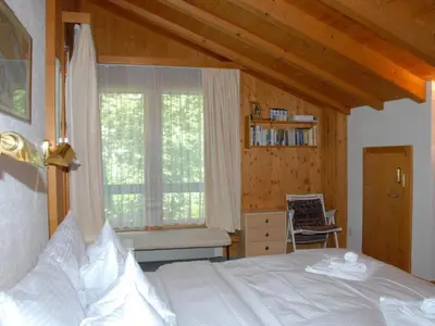Ein Bett oder Betten in einem Zimmer der Unterkunft Apartment Myrrena 6-Bett-Wohnung by Interhome