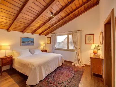 Ein Bett oder Betten in einem Zimmer der Unterkunft Apartment Penthouse Zen - Matterhornblick- 2 Min- vom Lift entfernt by Interhome