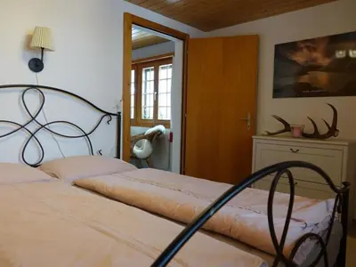 Ein Bett oder Betten in einem Zimmer der Unterkunft Apartment Haus Brog by Interhome