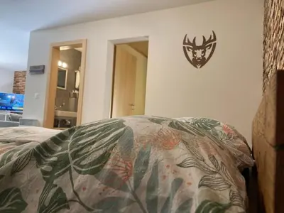 Ein Bett oder Betten in einem Zimmer der Unterkunft Apartment Morgengruss by Interhome