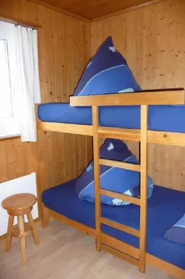 Ein Bett oder Betten in einem Zimmer der Unterkunft Apartment Saturn by Interhome