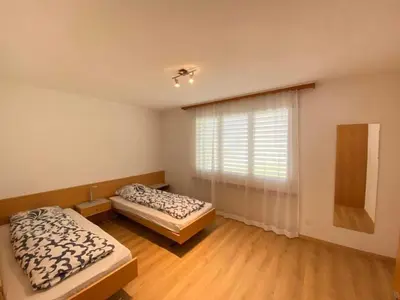 Ein Bett oder Betten in einem Zimmer der Unterkunft Apartment Rothornstrasse 21 by Interhome