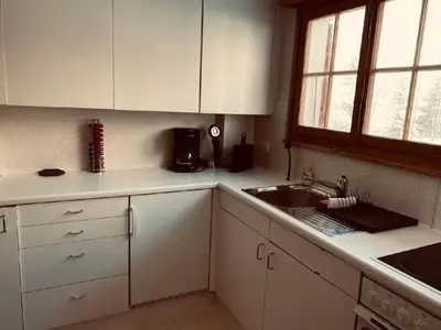 Küche/Küchenzeile in der Unterkunft Apartment Chalet Bacchus - EG by Interhome