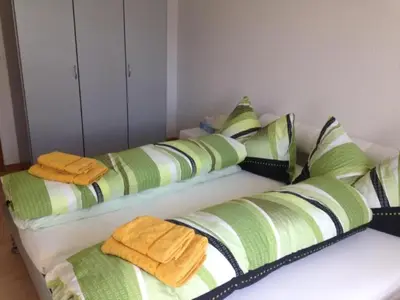 Ein Bett oder Betten in einem Zimmer der Unterkunft Apartment in Unterbäch by Interhome