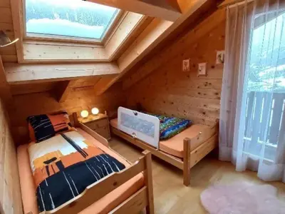 Ein Bett oder Betten in einem Zimmer der Unterkunft Apartment Mit Indoorrutschbahn by Interhome