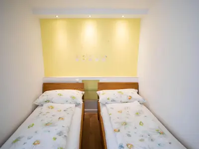 Ein Bett oder Betten in einem Zimmer der Unterkunft Apartment Whg-44 by Interhome