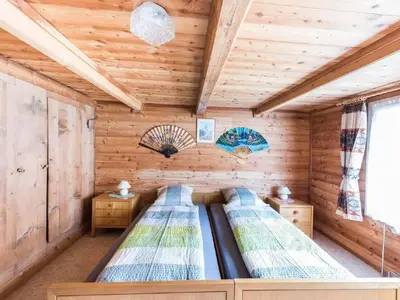 Ein Bett oder Betten in einem Zimmer der Unterkunft Holiday Home Wüthrich by Interhome