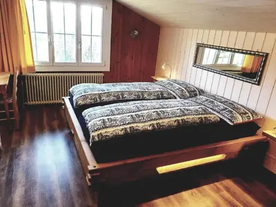 Ein Bett oder Betten in einem Zimmer der Unterkunft Apartment Bärengaden 4-Bettwohnung by Interhome