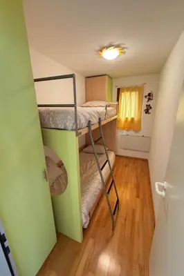 Ein Bett oder Betten in einem Zimmer der Unterkunft Apartment Walserwohnung by Interhome