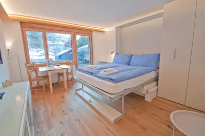 Ein Bett oder Betten in einem Zimmer der Unterkunft Studio Rollin