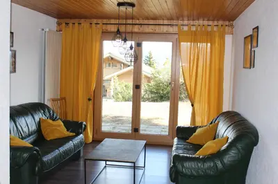 Ein Sitzbereich in der Unterkunft Anzère appartement de vacances calme et sympa