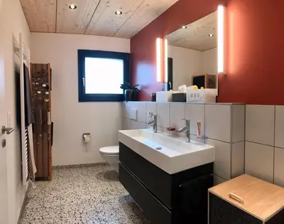 Ein Badezimmer in der Unterkunft comfort, authenticity and mountain views