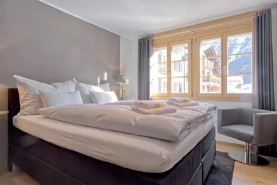Ein Bett oder Betten in einem Zimmer der Unterkunft Apartment Stotzhalten 4,5 - GRIWA RENT AG