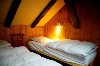 Ein Bett oder Betten in einem Zimmer der Unterkunft Résidence d'Evolène