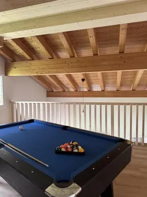 Ein Billardtisch in der Unterkunft Chalet Gadmer Herz