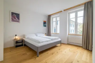 Ein Bett oder Betten in einem Zimmer der Unterkunft Apartment Harderstrasse