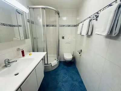 Ein Badezimmer in der Unterkunft Haus Sonnmatt