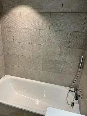 Ein Badezimmer in der Unterkunft Modern Jungfrau View Apartment with Terrace and AC at Interlaken West Station