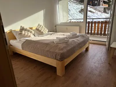 Ein Bett oder Betten in einem Zimmer der Unterkunft Sunny Alps View Central Bliss 2