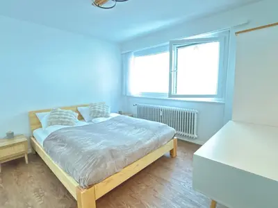 Ein Bett oder Betten in einem Zimmer der Unterkunft Sunny Alps View Central Bliss 2