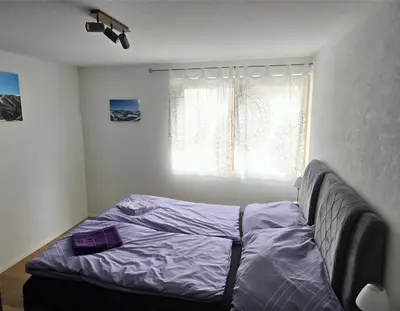 Ein Bett oder Betten in einem Zimmer der Unterkunft Beautiful 4-room apartment with 8 sleeping places